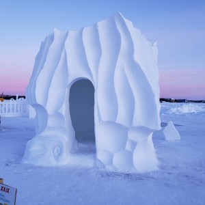 Artists' Choice Award winner, Titled "Coming Up for Air," at the snowcarving symposium in Yellowknife Northwest Territories Canada, 2024