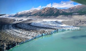 Aerial view of the Southern tongue of the Lowell Glacier. Medial moraines snake along the glacier to the toe that ends in Lowell Lake. 8-day packraft expedition down the Jarvis River to the Kaskawulsh River, to the Alsek River, into Lowell Lake, and across to the rock island that splits the Lowell Glacier into two tongues.